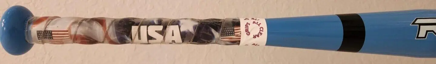 A close up of the arm band with an american flag on it