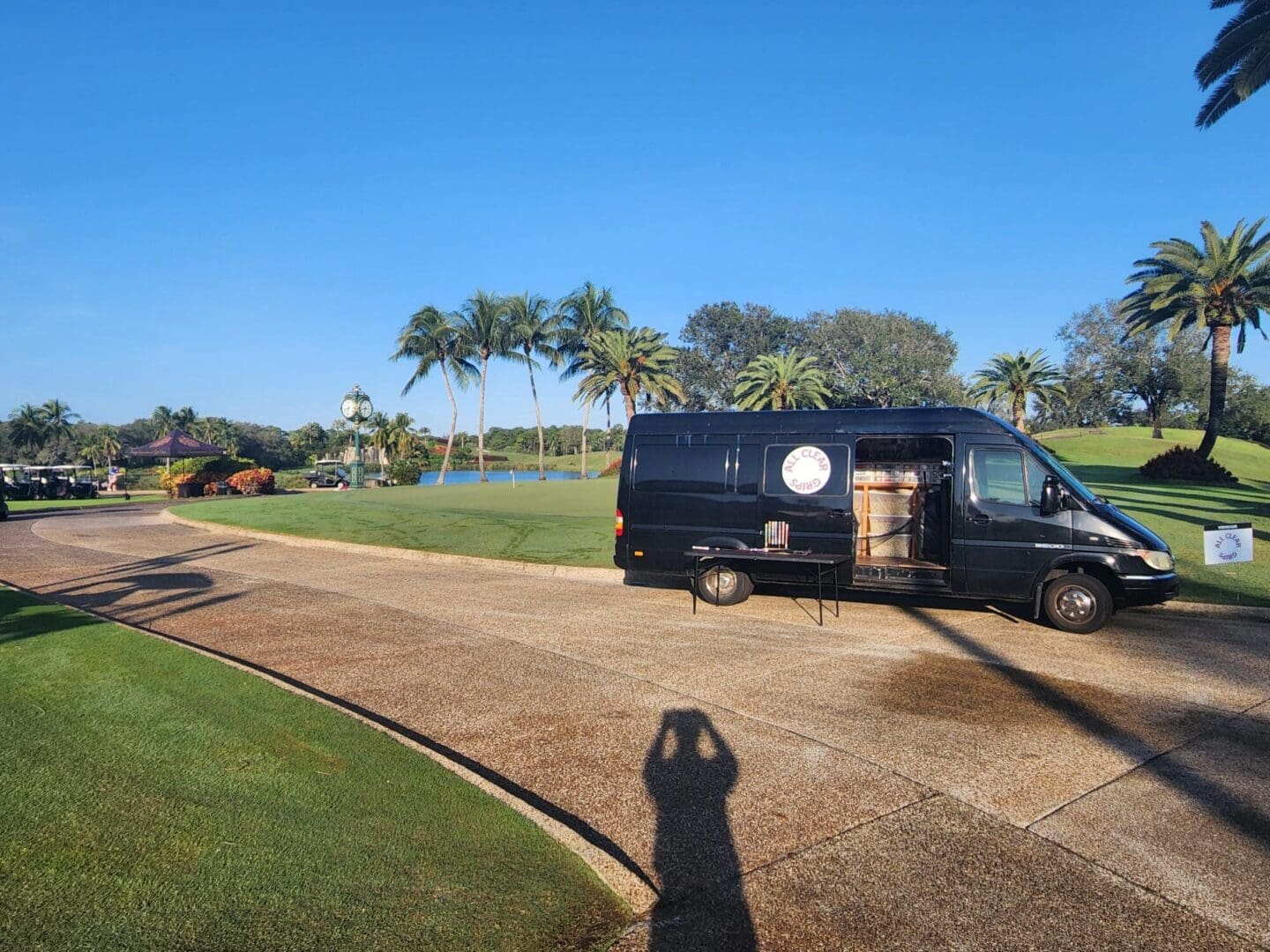 A van parked on the side of a road.